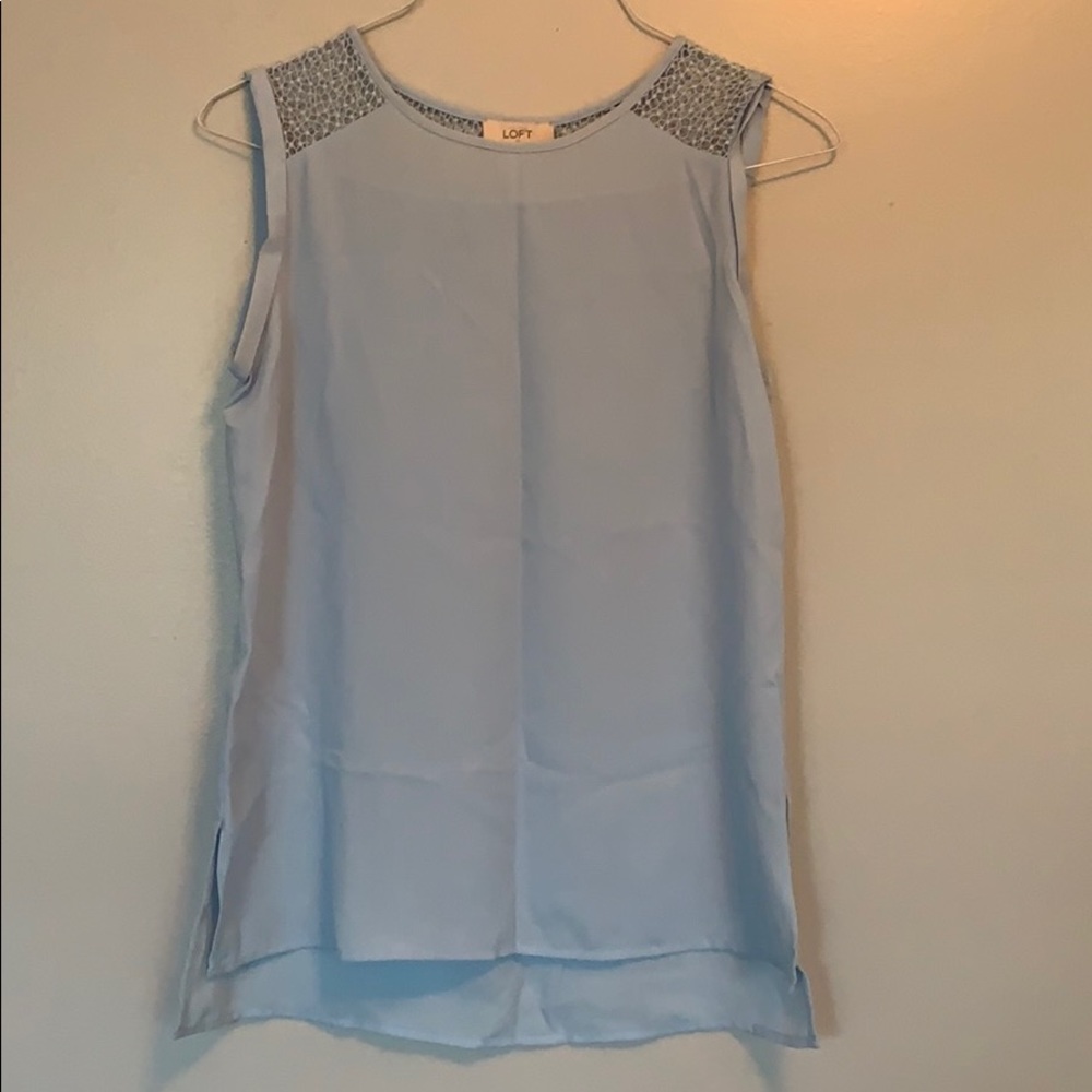Blue top with detailed shoulders